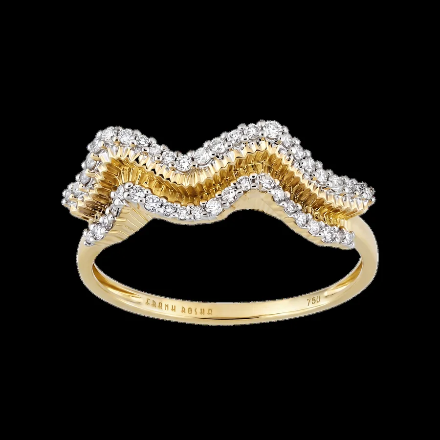 Ribbed gold and diamond wave ring, studio product shot